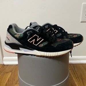 Great condition- New Balance 530 black with floral details